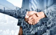 Handshake + Gebäude